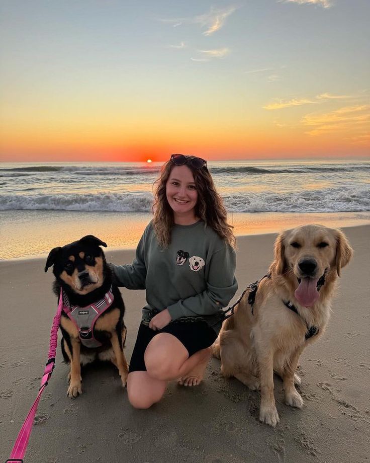 Person with their pet and embroidered garment